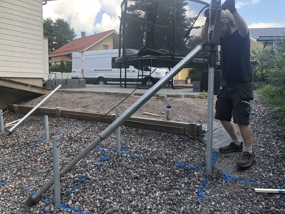 Förlängningsbom för skruvpåleinstallation